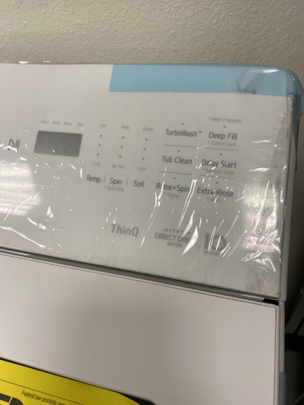 IMG_0226 LG 4.8 cu.ft. SMART Top Load Washer in Alpine White with 4-way Agitator, Easy Unload and AI Sensing