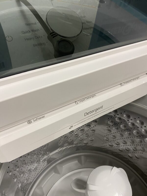IMG_0228 LG 4.8 cu.ft. SMART Top Load Washer in Alpine White with 4-way Agitator, Easy Unload and AI Sensing