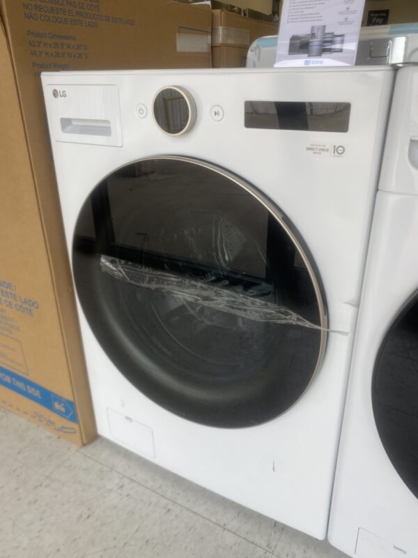 LG 5.0 cu. ft. Stackable Smart Front Load Washer washing lavadora clothes in White