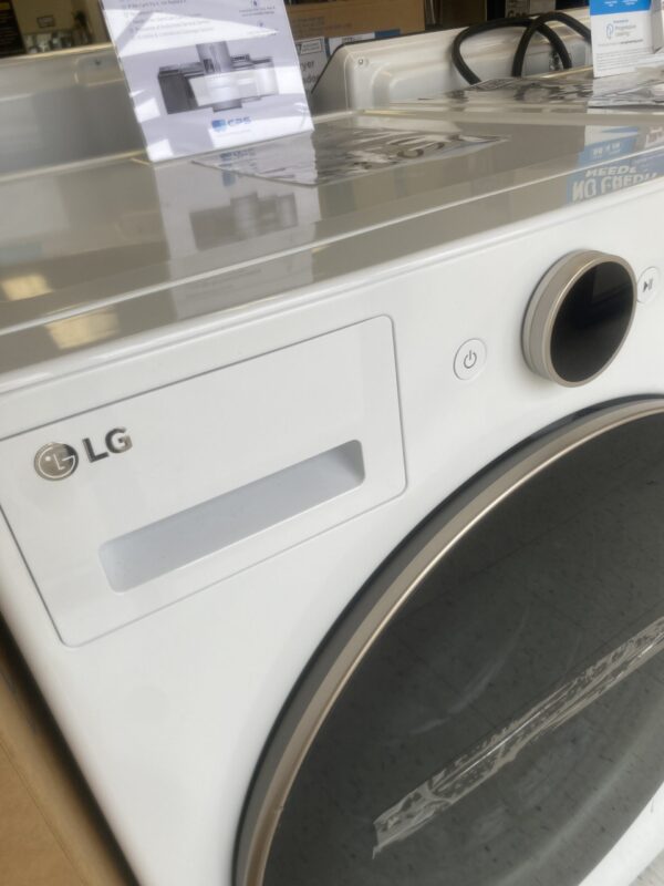 LG 5.0 cu. ft. Stackable Smart Front Load Washer washing lavadora clothes in White