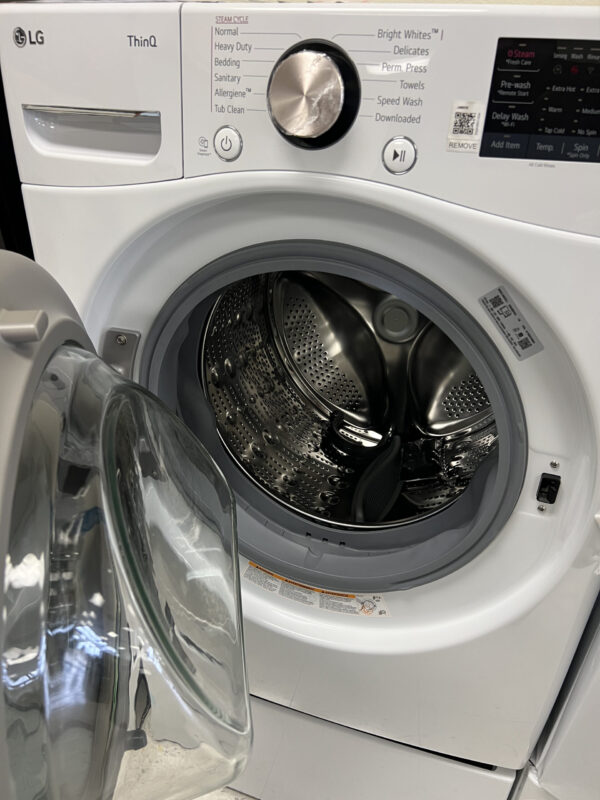 IMG_8018 (PED Included) LG 4.5 Cu. Ft. Stackable SMART Front Load Washer in White with Steam and TurboWash360 Technology